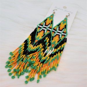 Super cute Boho style long statement beaded earrings.